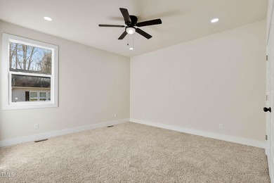 MODERN LUXURY LIVING AT LAKE ROYALE! This custom-built 3BR/3BA on River Golf and County Club at Lake Royale in North Carolina - for sale on GolfHomes.com, golf home, golf lot