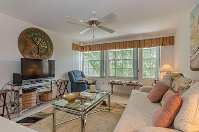 Experience serene living in this beautifully maintained on Village Golf Club in Florida - for sale on GolfHomes.com, golf home, golf lot