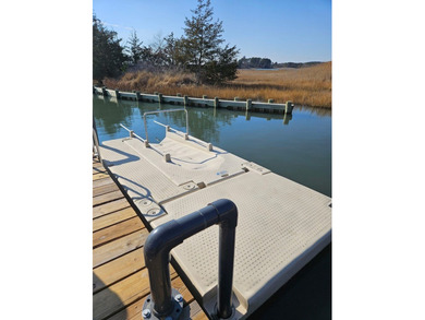 This is a rare treat.  Brand New 2025 Wildwood camper.  Just on Captains Cove Golf and Yacht Club in Virginia - for sale on GolfHomes.com, golf home, golf lot