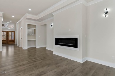 MODERN LUXURY LIVING AT LAKE ROYALE! This custom-built 3BR/3BA on River Golf and County Club at Lake Royale in North Carolina - for sale on GolfHomes.com, golf home, golf lot