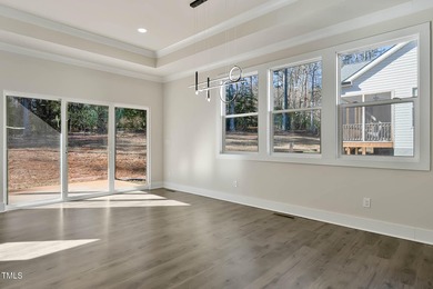 MODERN LUXURY LIVING AT LAKE ROYALE! This custom-built 3BR/3BA on River Golf and County Club at Lake Royale in North Carolina - for sale on GolfHomes.com, golf home, golf lot