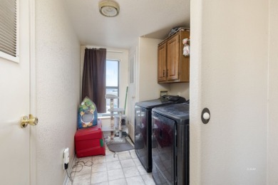 Check out 381 Oakshire Dr.! This home sits on a corner lot on Spring Creek Golf Course in Nevada - for sale on GolfHomes.com, golf home, golf lot