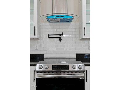 MODERN LUXURY LIVING AT LAKE ROYALE! This custom-built 3BR/3BA on River Golf and County Club at Lake Royale in North Carolina - for sale on GolfHomes.com, golf home, golf lot