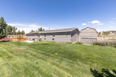 Check out 381 Oakshire Dr.! This home sits on a corner lot on Spring Creek Golf Course in Nevada - for sale on GolfHomes.com, golf home, golf lot