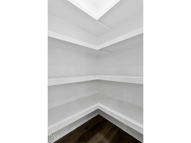 MODERN LUXURY LIVING AT LAKE ROYALE! This custom-built 3BR/3BA on River Golf and County Club at Lake Royale in North Carolina - for sale on GolfHomes.com, golf home, golf lot