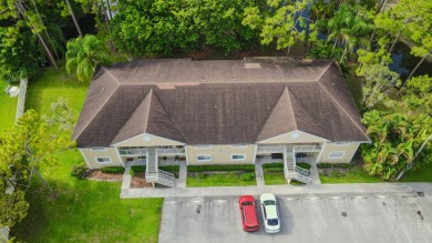 Experience serene living in this beautifully maintained on Village Golf Club in Florida - for sale on GolfHomes.com, golf home, golf lot