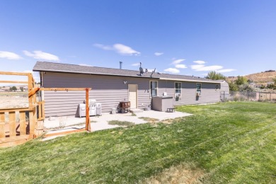 Check out 381 Oakshire Dr.! This home sits on a corner lot on Spring Creek Golf Course in Nevada - for sale on GolfHomes.com, golf home, golf lot