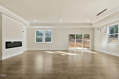 MODERN LUXURY LIVING AT LAKE ROYALE! This custom-built 3BR/3BA on River Golf and County Club at Lake Royale in North Carolina - for sale on GolfHomes.com, golf home, golf lot