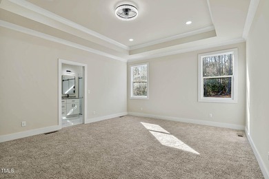 MODERN LUXURY LIVING AT LAKE ROYALE! This custom-built 3BR/3BA on River Golf and County Club at Lake Royale in North Carolina - for sale on GolfHomes.com, golf home, golf lot