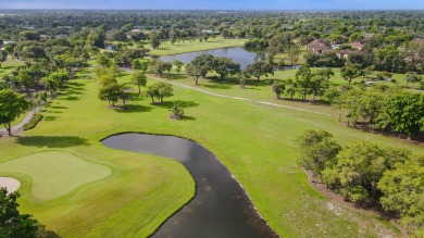 Experience serene living in this beautifully maintained on Village Golf Club in Florida - for sale on GolfHomes.com, golf home, golf lot