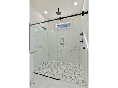 MODERN LUXURY LIVING AT LAKE ROYALE! This custom-built 3BR/3BA on River Golf and County Club at Lake Royale in North Carolina - for sale on GolfHomes.com, golf home, golf lot