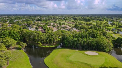 Experience serene living in this beautifully maintained on Village Golf Club in Florida - for sale on GolfHomes.com, golf home, golf lot
