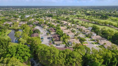 Experience serene living in this beautifully maintained on Village Golf Club in Florida - for sale on GolfHomes.com, golf home, golf lot