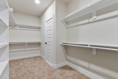 MODERN LUXURY LIVING AT LAKE ROYALE! This custom-built 3BR/3BA on River Golf and County Club at Lake Royale in North Carolina - for sale on GolfHomes.com, golf home, golf lot