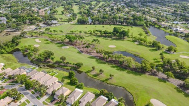 Experience serene living in this beautifully maintained on Village Golf Club in Florida - for sale on GolfHomes.com, golf home, golf lot
