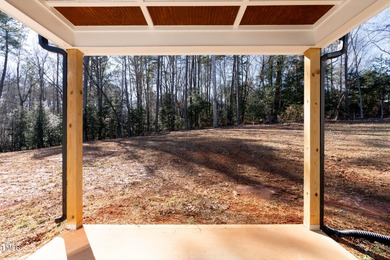 MODERN LUXURY LIVING AT LAKE ROYALE! This custom-built 3BR/3BA on River Golf and County Club at Lake Royale in North Carolina - for sale on GolfHomes.com, golf home, golf lot