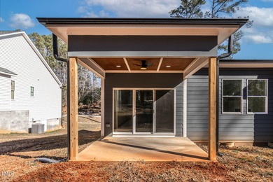 MODERN LUXURY LIVING AT LAKE ROYALE! This custom-built 3BR/3BA on River Golf and County Club at Lake Royale in North Carolina - for sale on GolfHomes.com, golf home, golf lot