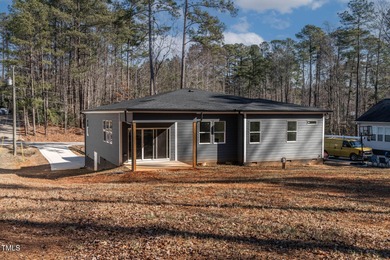 MODERN LUXURY LIVING AT LAKE ROYALE! This custom-built 3BR/3BA on River Golf and County Club at Lake Royale in North Carolina - for sale on GolfHomes.com, golf home, golf lot