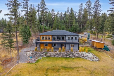 Welcome to this stunning contemporary walk-out rancher nestled on  in  - for sale on GolfHomes.com, golf home, golf lot