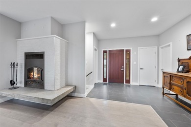 Welcome to this stunning contemporary walk-out rancher nestled on  in  - for sale on GolfHomes.com, golf home, golf lot