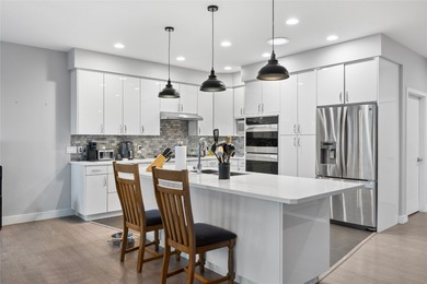 Welcome to this stunning contemporary walk-out rancher nestled on  in  - for sale on GolfHomes.com, golf home, golf lot