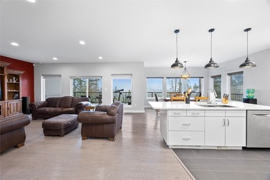 Welcome to this stunning contemporary walk-out rancher nestled on  in  - for sale on GolfHomes.com, golf home, golf lot