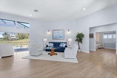 MAKE YOURSELF AT HOME IN THIS INVITING 3BR/2BA/2CG+ GOLF CART on The Legacy Golf and Tennis Club in Florida - for sale on GolfHomes.com, golf home, golf lot