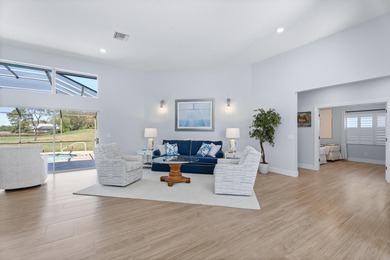 MAKE YOURSELF AT HOME IN THIS INVITING 3BR/2BA/2CG+ GOLF CART on The Legacy Golf and Tennis Club in Florida - for sale on GolfHomes.com, golf home, golf lot