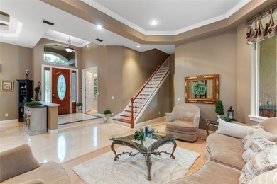 This stunning *4-bedroom, 3.5-bath **custom-built** home offers on Tuscawilla Country Club in Florida - for sale on GolfHomes.com, golf home, golf lot