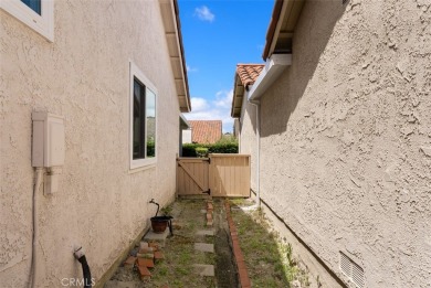 This single-level home is located in Mission Viejo in a on Casta del Sol Golf Course in California - for sale on GolfHomes.com, golf home, golf lot