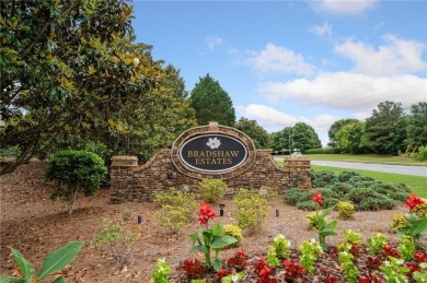 This property is a rare find in the upscale Holly on The Golf Club At Bradshaw Farm in Georgia - for sale on GolfHomes.com, golf home, golf lot