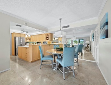 This inviting residence at the Islander Club of Longboat Key on Links on Longboat Golf Club in Florida - for sale on GolfHomes.com, golf home, golf lot