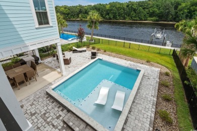 Welcome to coastal luxury at its finest in Boardwalk on the on Arrowhead Country Club in South Carolina - for sale on GolfHomes.com, golf home, golf lot