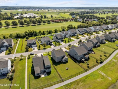 Stunning three-bedroom home in the highly desirable Lakeview on Eagle Creek Golf Club and Grill in North Carolina - for sale on GolfHomes.com, golf home, golf lot
