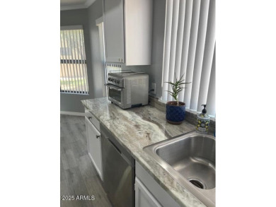 Charming End Unit Casita in Lovely Westbrook Village! Stunning on Westbrook Village Golf Club in Arizona - for sale on GolfHomes.com, golf home, golf lot