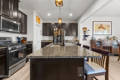 Stunning three-bedroom home in the highly desirable Lakeview on Eagle Creek Golf Club and Grill in North Carolina - for sale on GolfHomes.com, golf home, golf lot