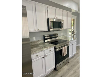 Charming End Unit Casita in Lovely Westbrook Village! Stunning on Westbrook Village Golf Club in Arizona - for sale on GolfHomes.com, golf home, golf lot