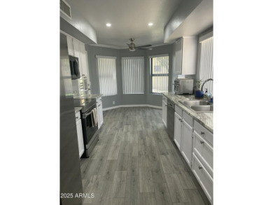 Charming End Unit Casita in Lovely Westbrook Village! Stunning on Westbrook Village Golf Club in Arizona - for sale on GolfHomes.com, golf home, golf lot