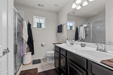 Stunning three-bedroom home in the highly desirable Lakeview on Eagle Creek Golf Club and Grill in North Carolina - for sale on GolfHomes.com, golf home, golf lot