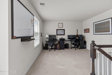 Stunning three-bedroom home in the highly desirable Lakeview on Eagle Creek Golf Club and Grill in North Carolina - for sale on GolfHomes.com, golf home, golf lot