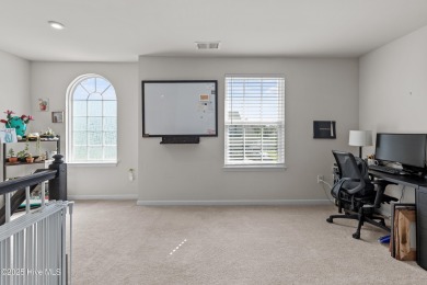 Stunning three-bedroom home in the highly desirable Lakeview on Eagle Creek Golf Club and Grill in North Carolina - for sale on GolfHomes.com, golf home, golf lot