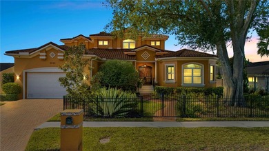 Welcome to an exceptional coastal retreat offering 5 bedrooms, 4 on Rocky Point Golf Course in Florida - for sale on GolfHomes.com, golf home, golf lot