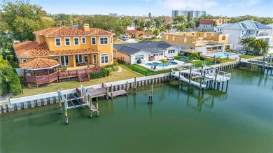 Welcome to an exceptional coastal retreat offering 5 bedrooms, 4 on Rocky Point Golf Course in Florida - for sale on GolfHomes.com, golf home, golf lot