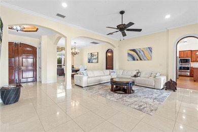 Welcome to an exceptional coastal retreat offering 5 bedrooms, 4 on Rocky Point Golf Course in Florida - for sale on GolfHomes.com, golf home, golf lot
