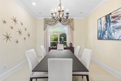 Welcome to an exceptional coastal retreat offering 5 bedrooms, 4 on Rocky Point Golf Course in Florida - for sale on GolfHomes.com, golf home, golf lot