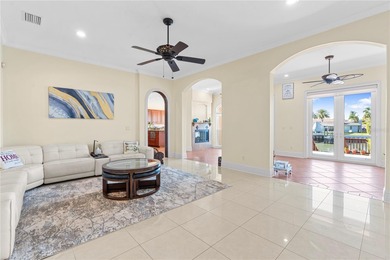 Welcome to an exceptional coastal retreat offering 5 bedrooms, 4 on Rocky Point Golf Course in Florida - for sale on GolfHomes.com, golf home, golf lot