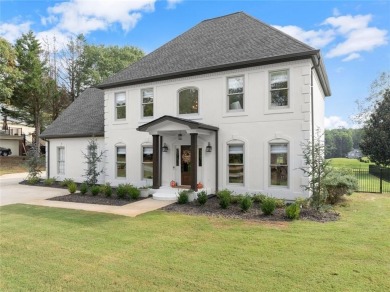 Absolutely stunning two-story home situated on the 6th fairway on Royal Lakes Golf and Country Club in Georgia - for sale on GolfHomes.com, golf home, golf lot