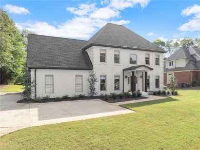 Absolutely stunning two-story home situated on the 6th fairway on Royal Lakes Golf and Country Club in Georgia - for sale on GolfHomes.com, golf home, golf lot