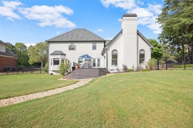 Absolutely stunning two-story home situated on the 6th fairway on Royal Lakes Golf and Country Club in Georgia - for sale on GolfHomes.com, golf home, golf lot