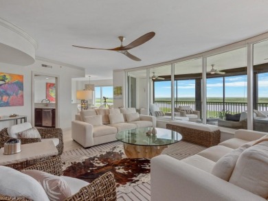 Experience refined coastal living in this elegant residence at on Hammock Bay in Florida - for sale on GolfHomes.com, golf home, golf lot